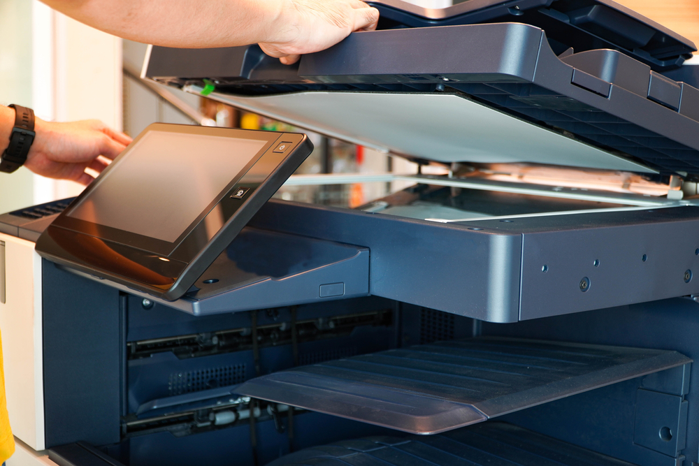 Men,Press,The,Button,Of,The,Copier.,Man,Copying,Paper