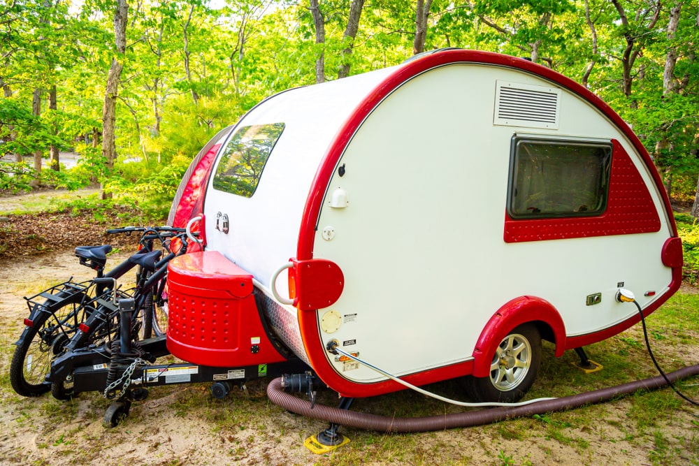 Red and White Teardrop Trailer with Bikes
