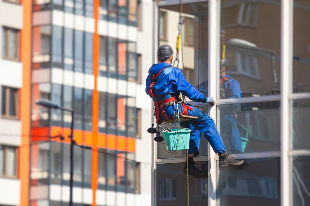 cleaning windows on a high rise 